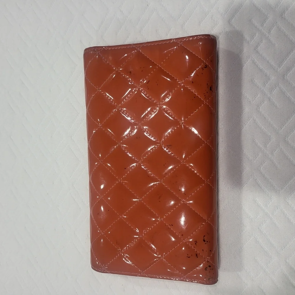 CHANEL Quilted Orange Matelasse Gold CC Logo Patent Leather Long Bifold Wallet.